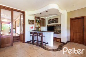 Casa em Condomínio à venda com 600m², 4 dormitórios, 4 suítes, 4 vagas, no bairro Terra Ville em PORTO ALEGRE