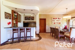 Casa em Condomínio à venda com 600m², 4 dormitórios, 4 suítes, 4 vagas, no bairro Terra Ville em PORTO ALEGRE