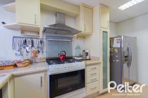 Casa em Condomínio à venda com 600m², 4 dormitórios, 4 suítes, 4 vagas, no bairro Terra Ville em PORTO ALEGRE