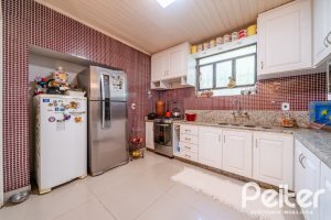 Casa à venda com 350m², 4 dormitórios, 4 suítes, 4 vagas, no bairro Tristeza em Porto Alegre