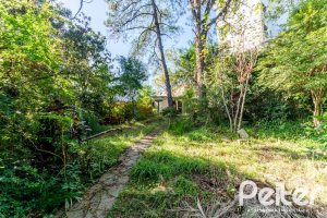 Casa à venda com 350m², 4 dormitórios, 4 suítes, 4 vagas, no bairro Tristeza em Porto Alegre