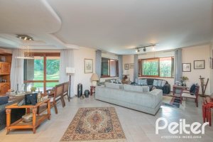 Casa em Condomínio à venda com 486m², 4 dormitórios, 3 suítes, 4 vagas, no bairro Cavalhada em PORTO ALEGRE