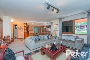 Casa em Condomínio à venda com 486m², 4 dormitórios, 3 suítes, 4 vagas, no bairro Cavalhada em PORTO ALEGRE