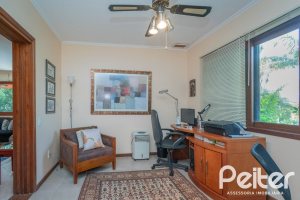 Casa em Condomínio à venda com 486m², 4 dormitórios, 3 suítes, 4 vagas, no bairro Cavalhada em PORTO ALEGRE