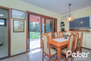 Casa em Condomínio à venda com 486m², 4 dormitórios, 3 suítes, 4 vagas, no bairro Cavalhada em PORTO ALEGRE