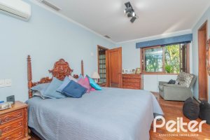 Casa em Condomínio à venda com 486m², 4 dormitórios, 3 suítes, 4 vagas, no bairro Cavalhada em PORTO ALEGRE