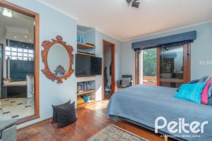 Casa em Condomínio à venda com 486m², 4 dormitórios, 3 suítes, 4 vagas, no bairro Cavalhada em PORTO ALEGRE