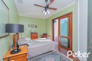 Casa em Condomínio à venda com 486m², 4 dormitórios, 3 suítes, 4 vagas, no bairro Cavalhada em PORTO ALEGRE