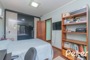 Casa em Condomínio à venda com 486m², 4 dormitórios, 3 suítes, 4 vagas, no bairro Cavalhada em PORTO ALEGRE