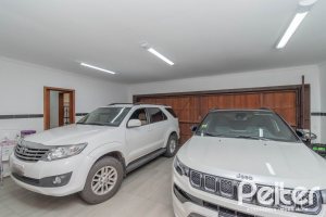 Casa em Condomínio à venda com 486m², 4 dormitórios, 3 suítes, 4 vagas, no bairro Cavalhada em PORTO ALEGRE