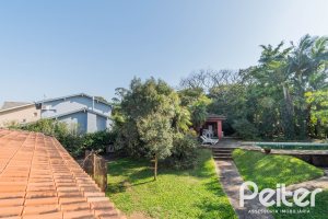 Casa em Condomínio à venda com 486m², 4 dormitórios, 3 suítes, 4 vagas, no bairro Cavalhada em PORTO ALEGRE