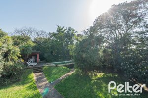 Casa em Condomínio à venda com 486m², 4 dormitórios, 3 suítes, 4 vagas, no bairro Cavalhada em PORTO ALEGRE