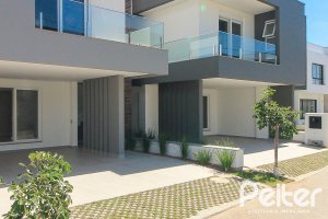 Casa em Condomínio à venda com 209m², 3 dormitórios, 3 suítes, 2 vagas, no bairro Ipanema em Porto Alegre