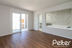 Casa em Condomínio à venda com 209m², 3 dormitórios, 3 suítes, 2 vagas, no bairro Ipanema em Porto Alegre