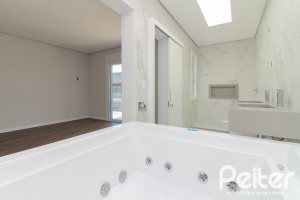 Casa em Condomínio à venda com 209m², 3 dormitórios, 3 suítes, 2 vagas, no bairro Ipanema em Porto Alegre