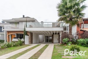 Casa em Condomínio à venda com 294m², 5 dormitórios, 5 suítes, 4 vagas, no bairro Terra Ville em PORTO ALEGRE