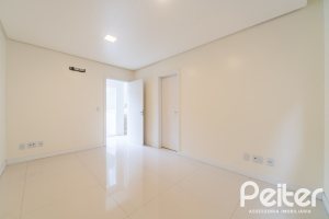 Casa em Condomínio à venda com 294m², 5 dormitórios, 5 suítes, 4 vagas, no bairro Terra Ville em PORTO ALEGRE