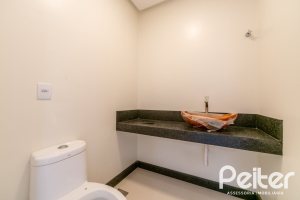 Casa em Condomínio à venda com 294m², 5 dormitórios, 5 suítes, 4 vagas, no bairro Terra Ville em PORTO ALEGRE