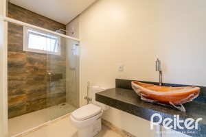 Casa em Condomínio à venda com 294m², 5 dormitórios, 5 suítes, 4 vagas, no bairro Terra Ville em PORTO ALEGRE