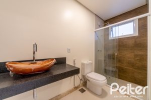 Casa em Condomínio à venda com 294m², 5 dormitórios, 5 suítes, 4 vagas, no bairro Terra Ville em PORTO ALEGRE