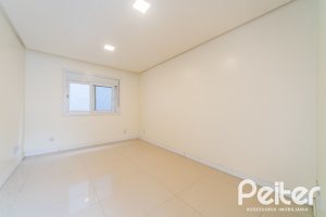 Casa em Condomínio à venda com 294m², 5 dormitórios, 5 suítes, 4 vagas, no bairro Terra Ville em PORTO ALEGRE