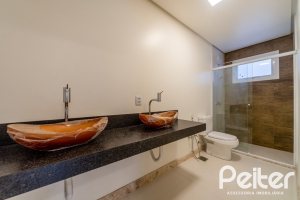 Casa em Condomínio à venda com 294m², 5 dormitórios, 5 suítes, 4 vagas, no bairro Terra Ville em PORTO ALEGRE