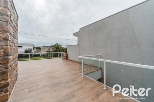 Casa em Condomínio à venda com 294m², 5 dormitórios, 5 suítes, 4 vagas, no bairro Terra Ville em PORTO ALEGRE