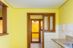 Casa em Condomínio à venda com 174m², 3 dormitórios, 1 suíte, 2 vagas, no bairro Guarujá em Porto Alegre