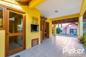 Casa em Condomínio à venda com 174m², 3 dormitórios, 1 suíte, 2 vagas, no bairro Guarujá em Porto Alegre