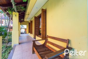 Casa em Condomínio à venda com 174m², 3 dormitórios, 1 suíte, 2 vagas, no bairro Guarujá em Porto Alegre