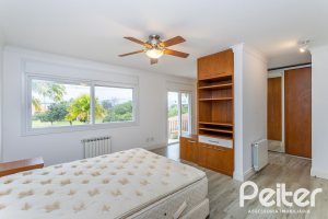 Casa em Condomínio à venda com 615m², 4 dormitórios, 4 suítes, 6 vagas, no bairro Terra Ville em PORTO ALEGRE