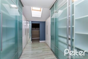 Casa em Condomínio à venda com 615m², 4 dormitórios, 4 suítes, 6 vagas, no bairro Terra Ville em PORTO ALEGRE