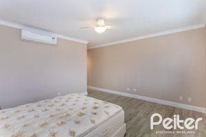 Casa em Condomínio à venda com 615m², 4 dormitórios, 4 suítes, 6 vagas, no bairro Terra Ville em PORTO ALEGRE