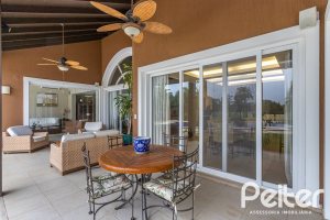 Casa em Condomínio à venda com 615m², 4 dormitórios, 4 suítes, 6 vagas, no bairro Terra Ville em PORTO ALEGRE