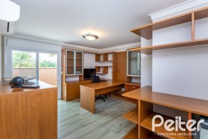 Casa em Condomínio à venda com 615m², 4 dormitórios, 4 suítes, 6 vagas, no bairro Terra Ville em PORTO ALEGRE