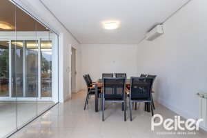 Casa em Condomínio à venda com 615m², 4 dormitórios, 4 suítes, 6 vagas, no bairro Terra Ville em PORTO ALEGRE