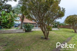 Casa em Condomínio à venda com 615m², 4 dormitórios, 4 suítes, 6 vagas, no bairro Terra Ville em PORTO ALEGRE