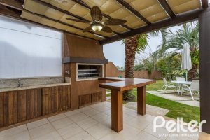 Casa em Condomínio à venda com 615m², 4 dormitórios, 4 suítes, 6 vagas, no bairro Terra Ville em PORTO ALEGRE