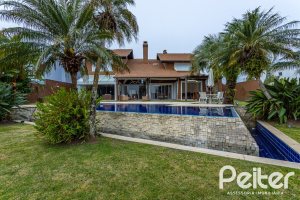 Casa em Condomínio à venda com 615m², 4 dormitórios, 4 suítes, 6 vagas, no bairro Terra Ville em PORTO ALEGRE