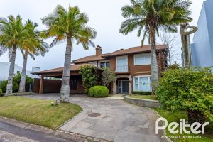 Casa em Condomínio à venda com 615m², 4 dormitórios, 4 suítes, 6 vagas, no bairro Terra Ville em PORTO ALEGRE