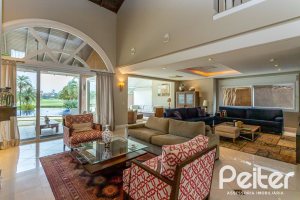 Casa em Condomínio à venda com 615m², 4 dormitórios, 4 suítes, 6 vagas, no bairro Terra Ville em PORTO ALEGRE