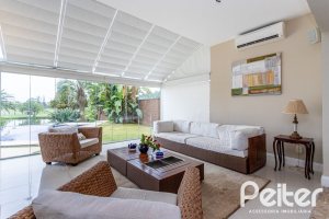 Casa em Condomínio à venda com 615m², 4 dormitórios, 4 suítes, 6 vagas, no bairro Terra Ville em PORTO ALEGRE