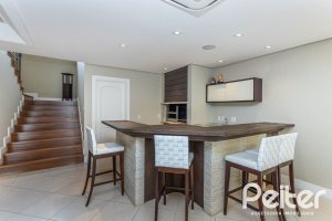 Casa em Condomínio à venda com 615m², 4 dormitórios, 4 suítes, 6 vagas, no bairro Terra Ville em PORTO ALEGRE