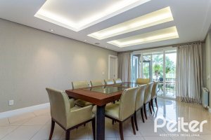 Casa em Condomínio à venda com 615m², 4 dormitórios, 4 suítes, 6 vagas, no bairro Terra Ville em PORTO ALEGRE