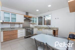 Casa em Condomínio à venda com 615m², 4 dormitórios, 4 suítes, 6 vagas, no bairro Terra Ville em PORTO ALEGRE