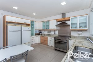 Casa em Condomínio à venda com 615m², 4 dormitórios, 4 suítes, 6 vagas, no bairro Terra Ville em PORTO ALEGRE