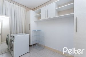 Casa em Condomínio à venda com 615m², 4 dormitórios, 4 suítes, 6 vagas, no bairro Terra Ville em PORTO ALEGRE