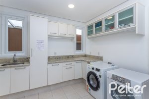 Casa em Condomínio à venda com 615m², 4 dormitórios, 4 suítes, 6 vagas, no bairro Terra Ville em PORTO ALEGRE
