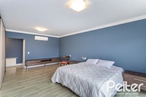 Casa em Condomínio à venda com 615m², 4 dormitórios, 4 suítes, 6 vagas, no bairro Terra Ville em PORTO ALEGRE