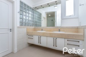 Casa em Condomínio à venda com 615m², 4 dormitórios, 4 suítes, 6 vagas, no bairro Terra Ville em PORTO ALEGRE